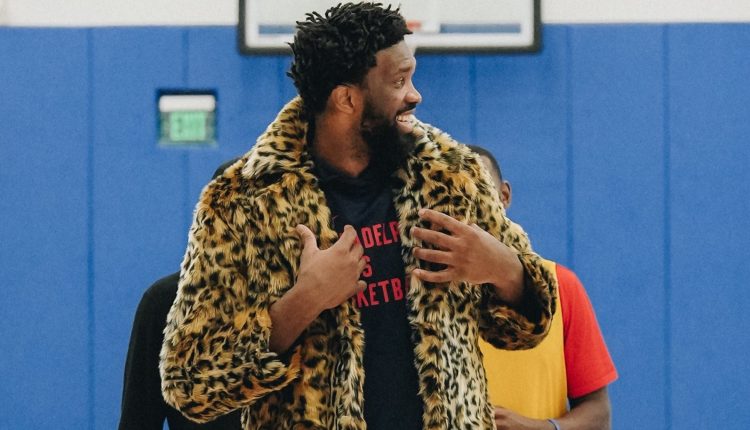 joel-embiid-leopard-fur-coat-with-skechers-skx-float (2)